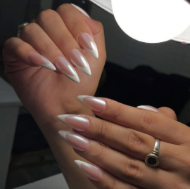 Nude pink-and-white ombre stiletto nails with subtle shimmer by Five Star Nails